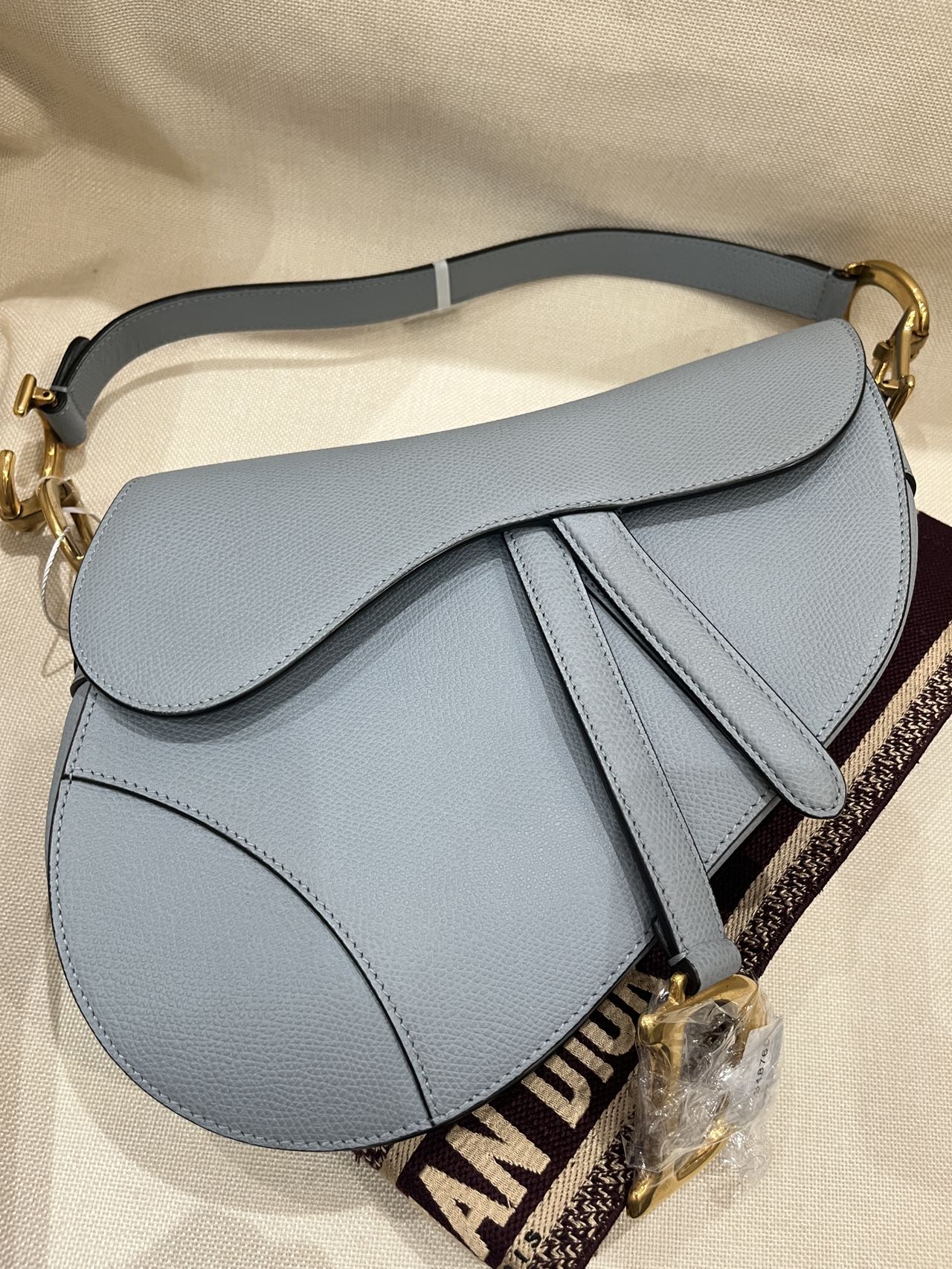 Pre-owned Certified Dior Saddle in Sky Blue Grained Calfskin with Golden Hardware, 2018, w/ Dior dust bag, Dior canvas strap